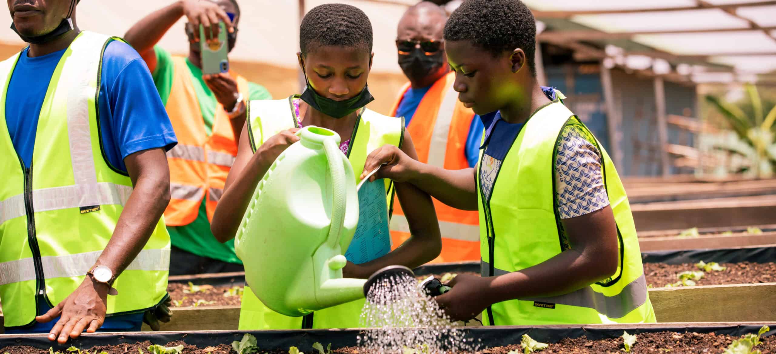 Children-watering-Crops